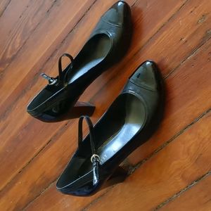 Black heels with patent leather toes